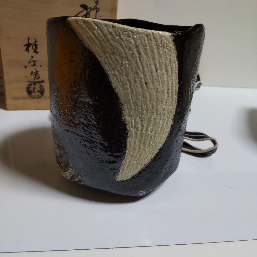 手作り陶器 茶碗 黒色と白色の模様 空中作写し寒月茶碗です、‼️