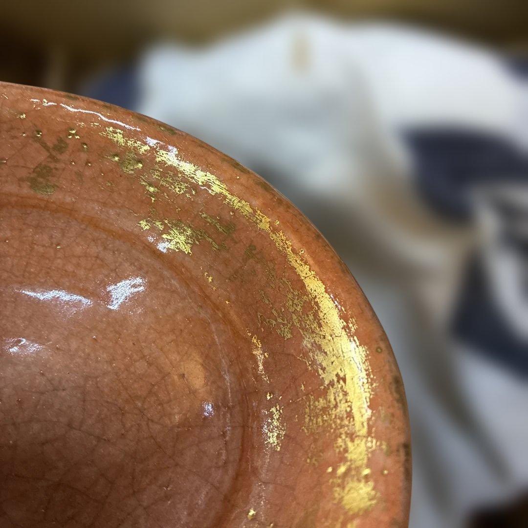 オレンジ陶器ボウル 金色の縁取り
