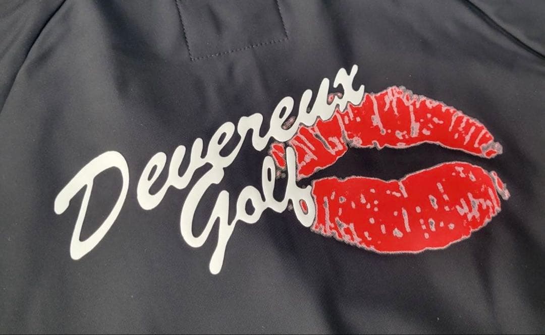 新品未使用【デヴァロー ゴルフ】レディース バッグプリントリップブルゾン 黒 Ｍ
