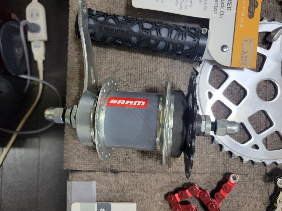 車輪掛け、ハンドルグリップ、自転車持運びカバー、ツェーン