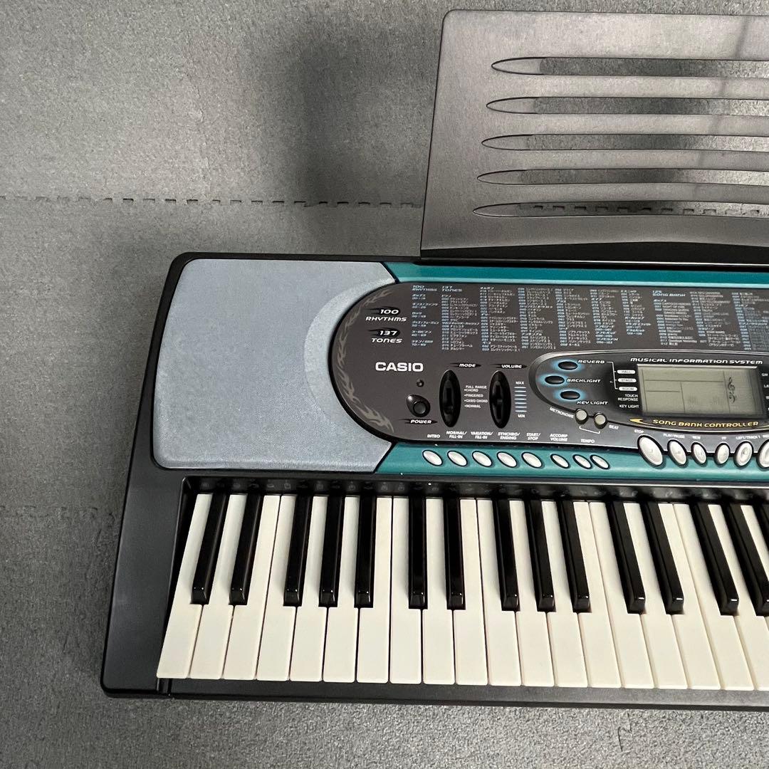 送料込み【美品】CASIO 光ナビゲーションキーボード　スタンド付　2点セット