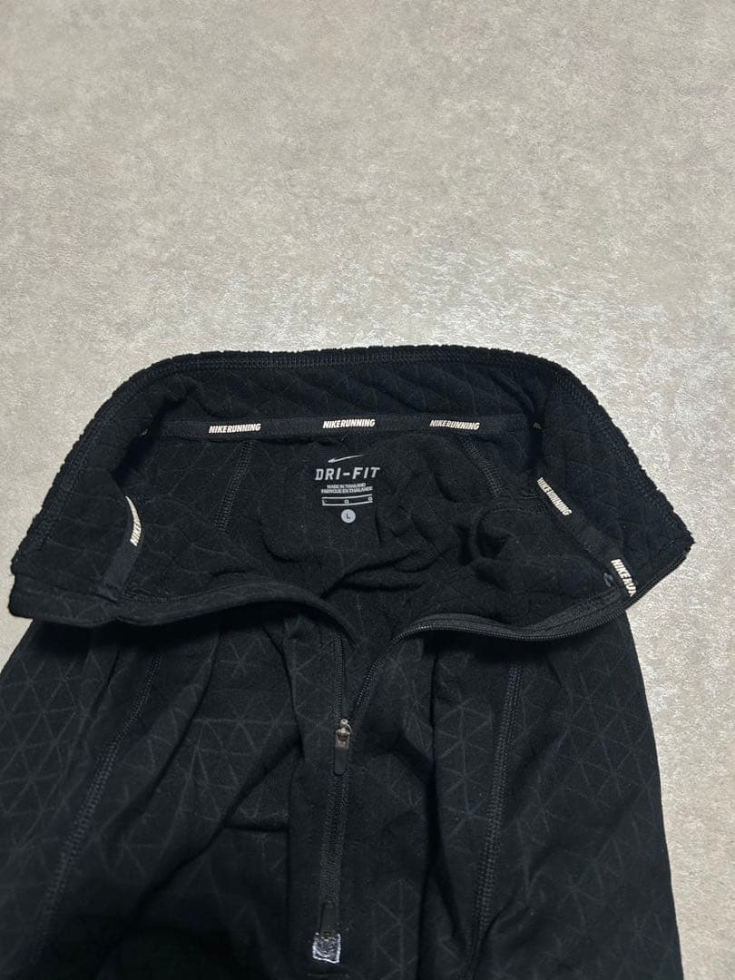 希少 ナイキランニング 幾何学模様 リフレクターロゴ ハーフジップ ジャケット