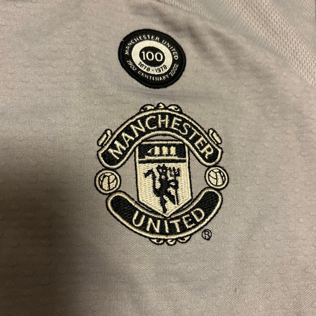 マンチェスター・ユナイテッド Umbro グレー長袖シャツ　サイズＬ