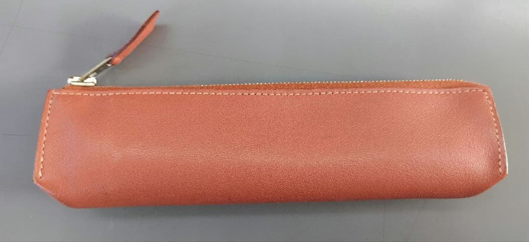 man　エルメスペンケースピッコロ+スヌーピーレスポトート