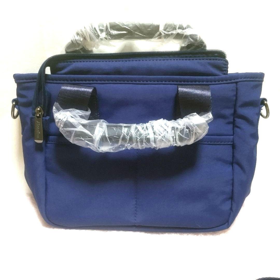 ★新品未使用★DOCUS ドゥーカス カートラウンドバックストラップ付ネイビー