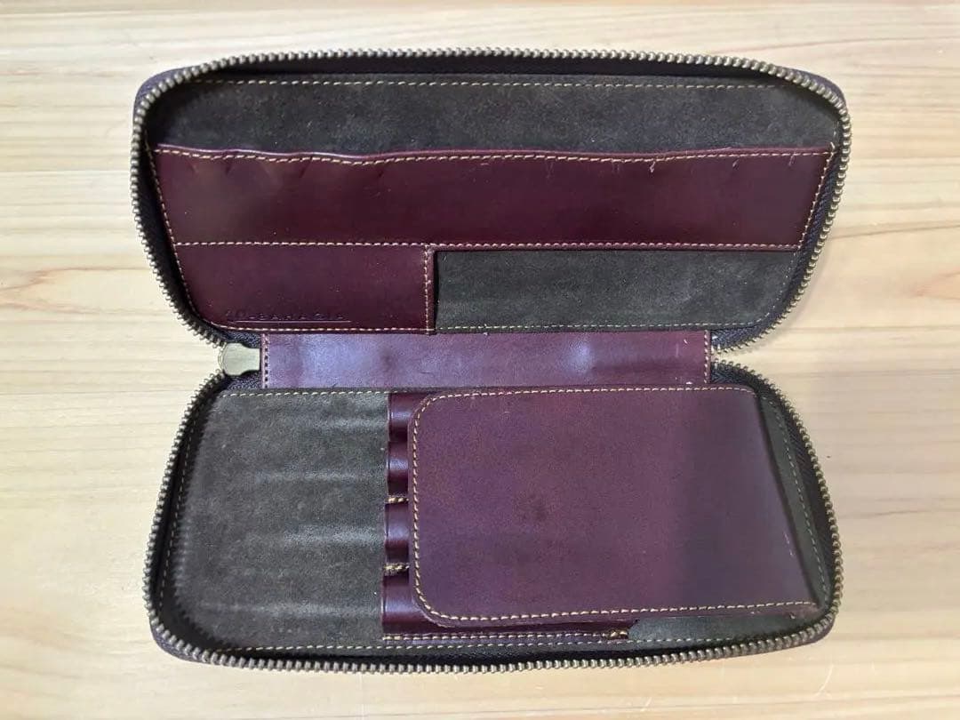 バハギア ラウンドジップペンケース モスト