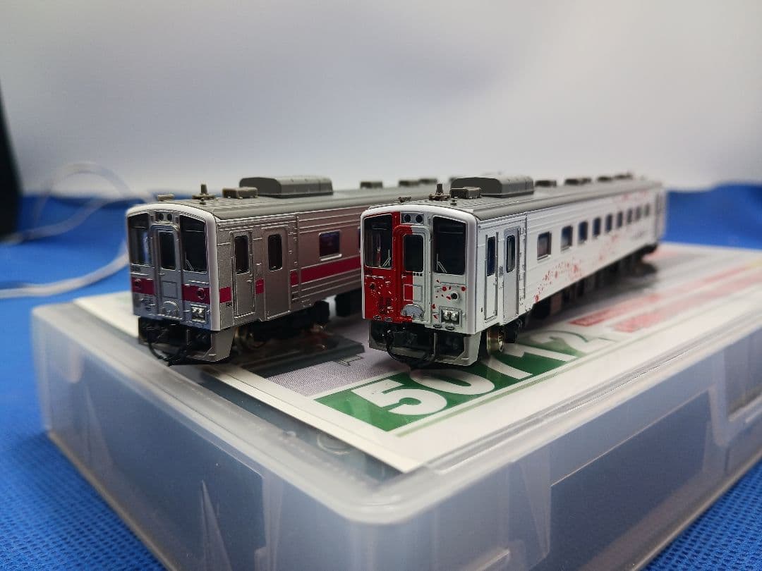 GM 50712 30408 地球探索鉄道花咲線ラッピングトレイン ピンク帯2両