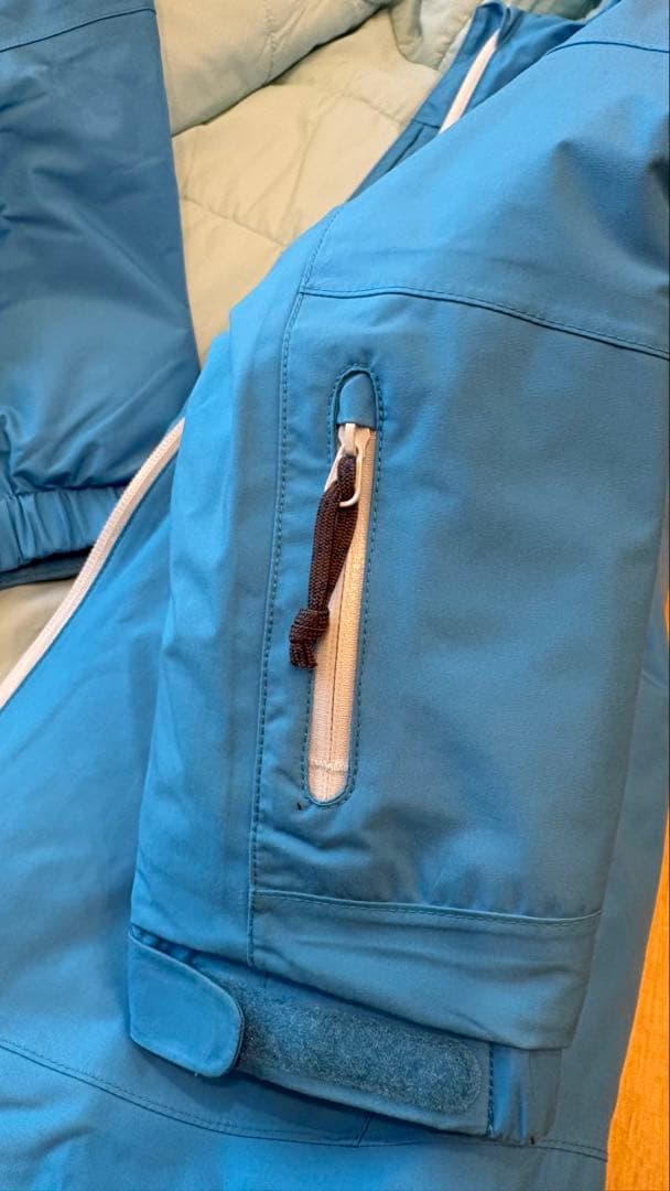 モンベル　mont-bell パウダーステップジャケット　140 水色