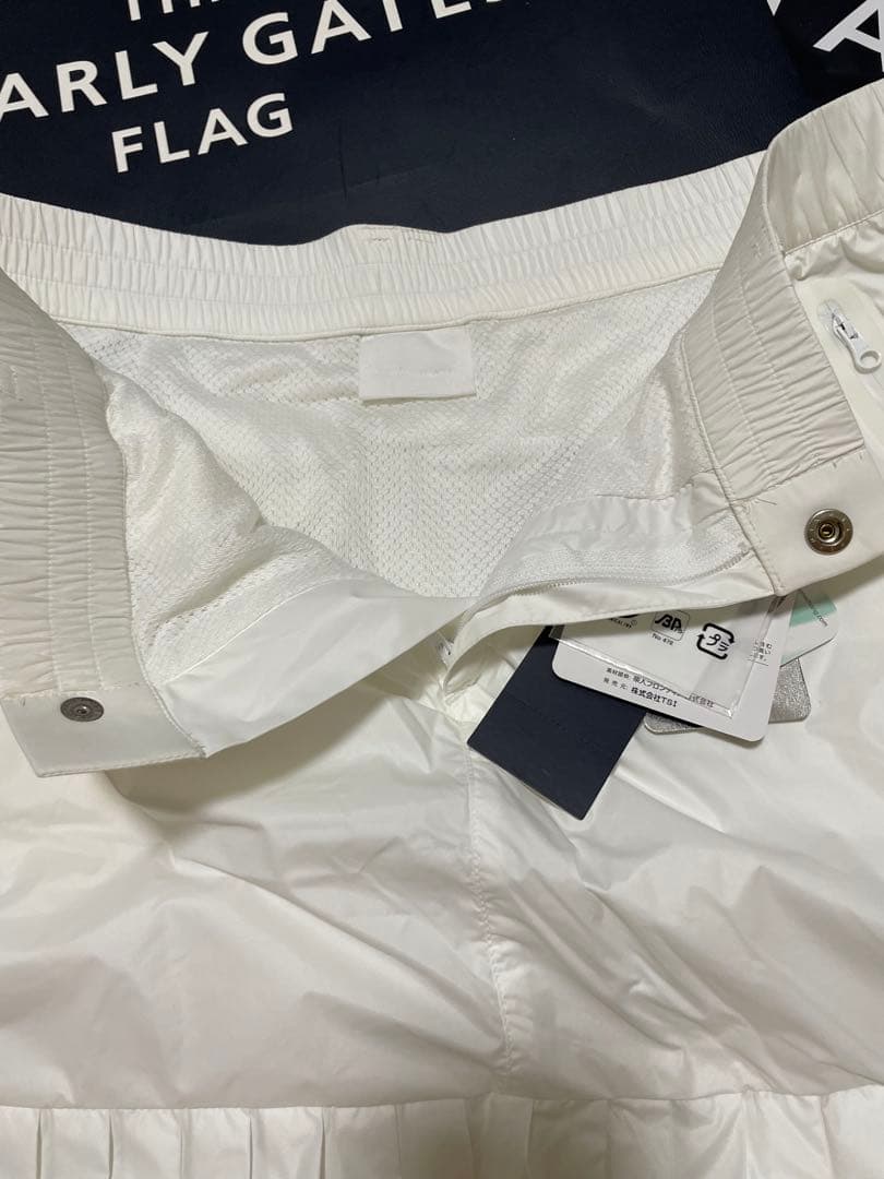 パーリーゲイツ 【軽量保温】バックロゴプリーツ切替タフタスカートサイズ2