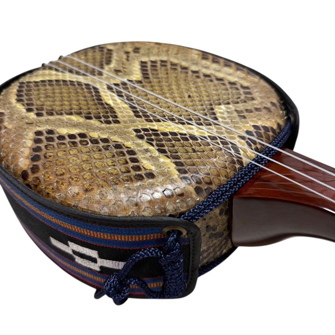 新城慎幸作 三線 紅木棹 本蛇皮強化張り 保証書付 ハードケース付 沖縄三線