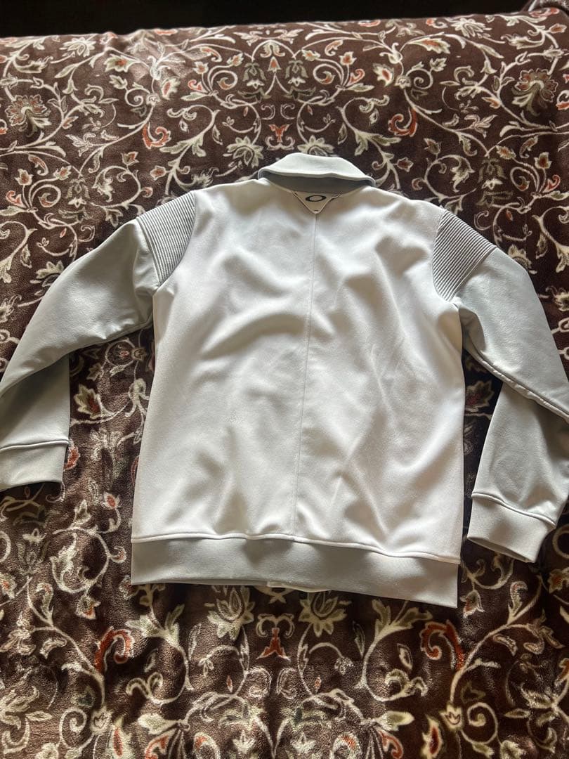 極美品 オークリー スカル ゴルフブルゾン ホワイトXL