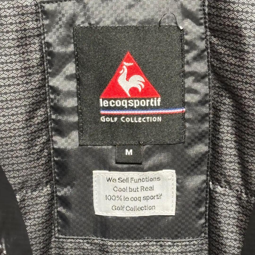 ルコックスポルティフ　ジャケット　中綿　ヒートナビ　撥水　ビックロゴ　ブラック