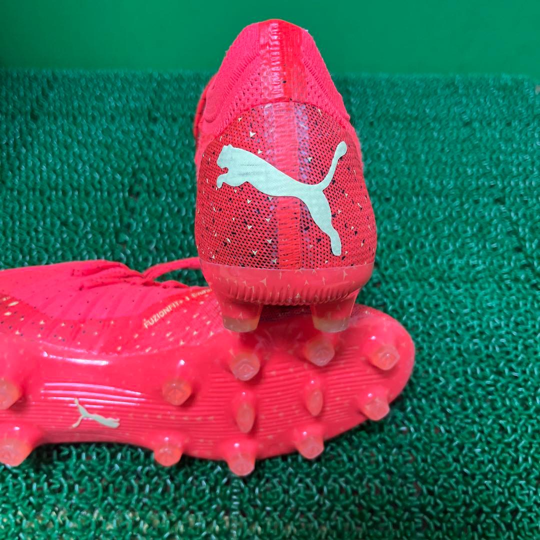 プーマ サッカースパイクフューチャーZ 1.4 HG/AG(オレンジ×イエロー)