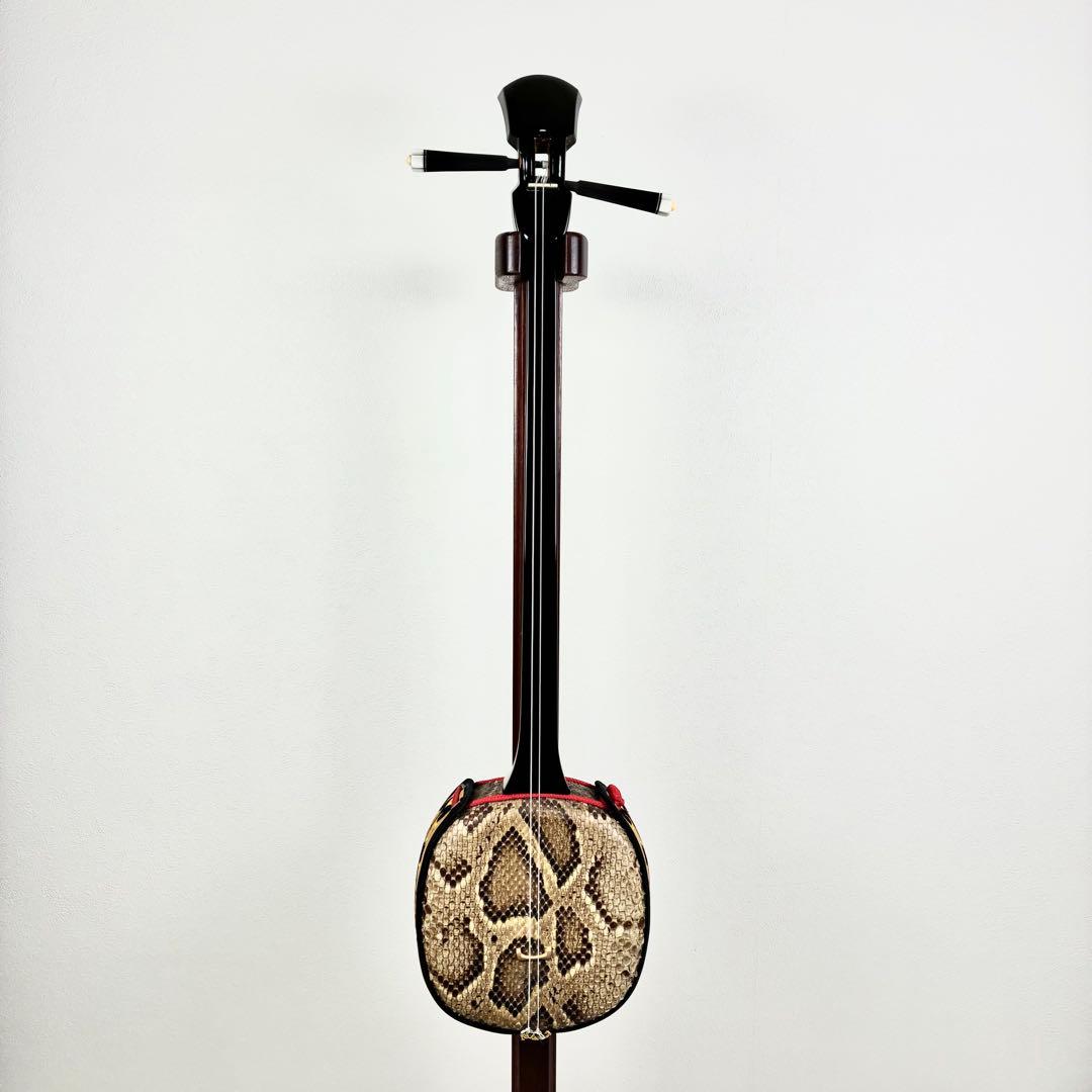 沖縄 三線 本蛇皮 黒漆 カラクイ1本欠品