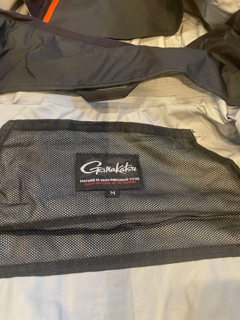 がまかつフィッシングスーツ(上下セット) 黒/オレンジ