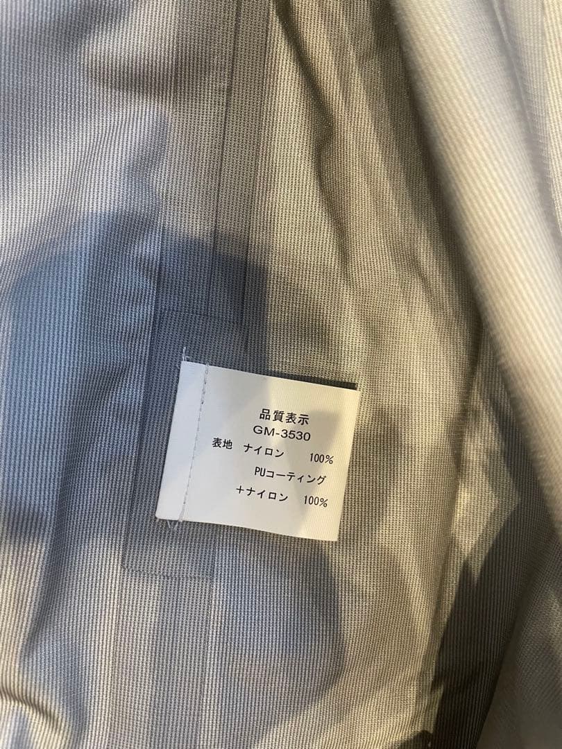 がまかつフィッシングスーツ(上下セット) 黒/オレンジ