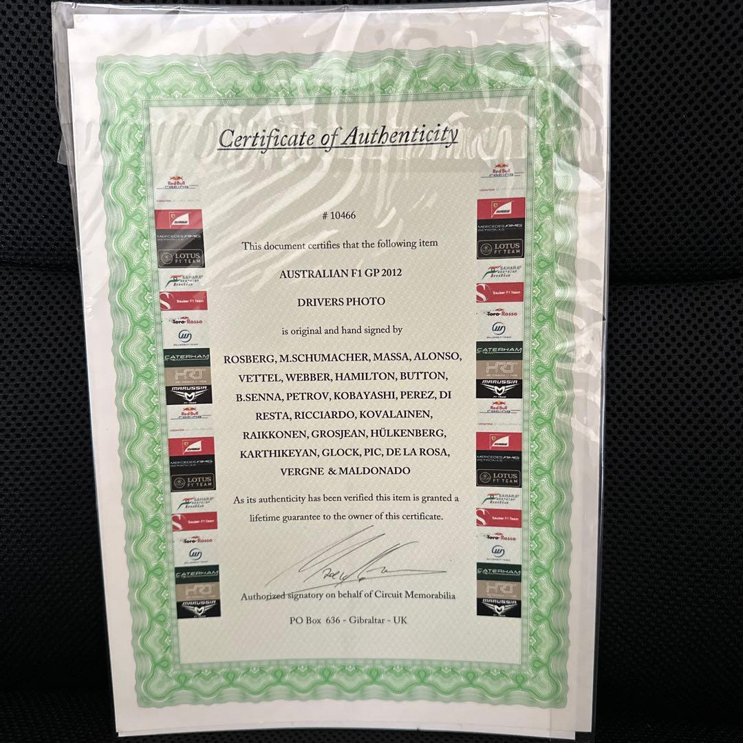 F1 ドライバー 直筆サイン入り写真 2012