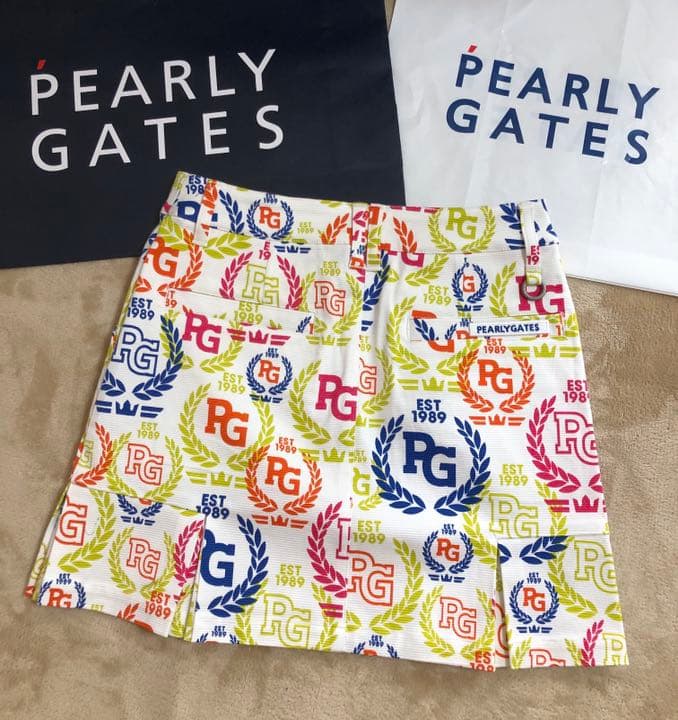 パーリーゲイツグログランカラフルローリエプリントペプラムプリーツスカート00