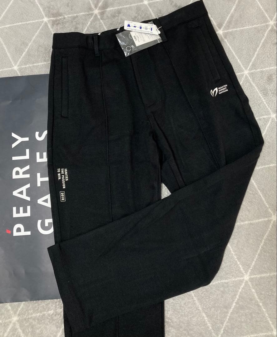 新品 パーリーゲイツ マスターバニー ソリストヒート ツイルパンツ(4)M/黒
