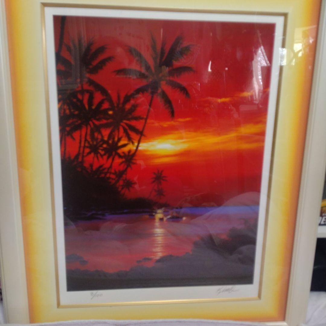 題名夕焼けの海、作者 Kim 、版画Ｎｏ．8/100です。