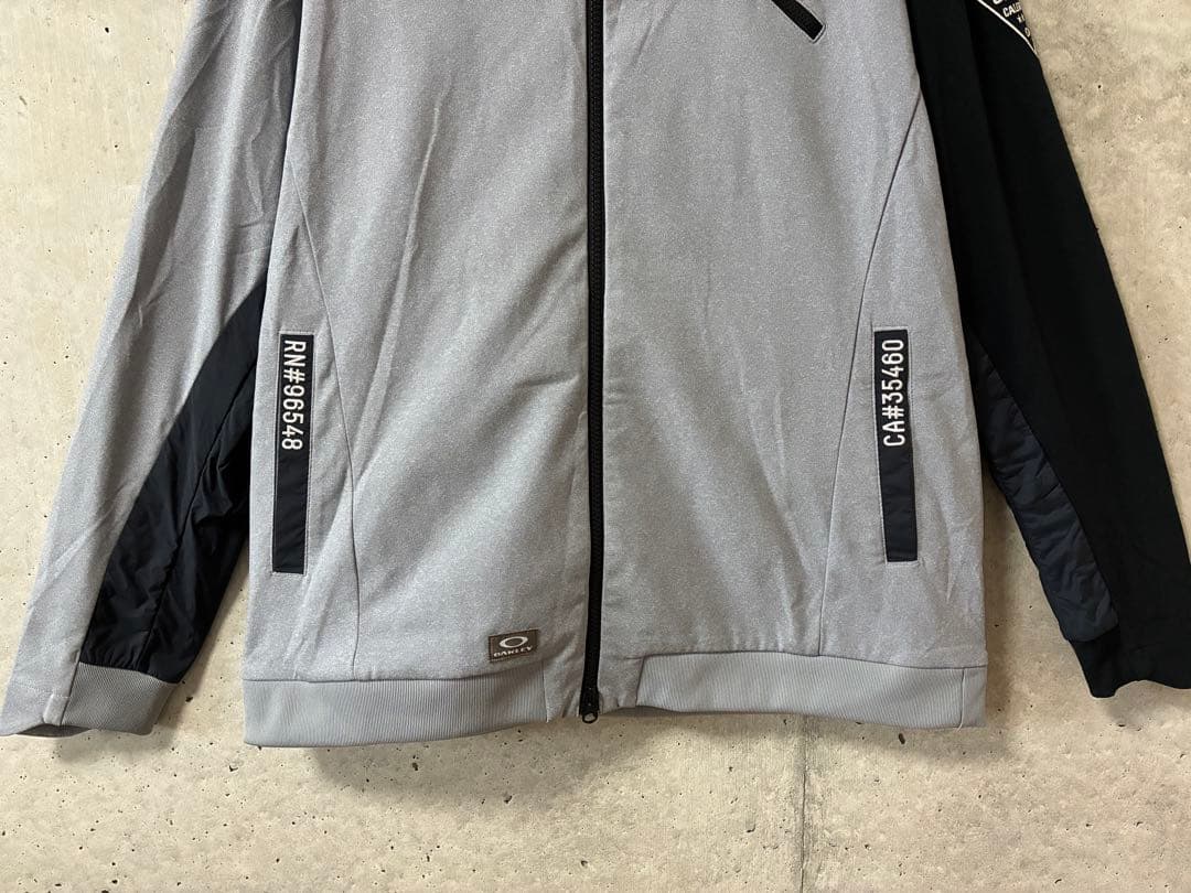 OAKLEY ゴルフウェア ジャケット ブルゾン ジップ 刺繍 グレー 2XL
