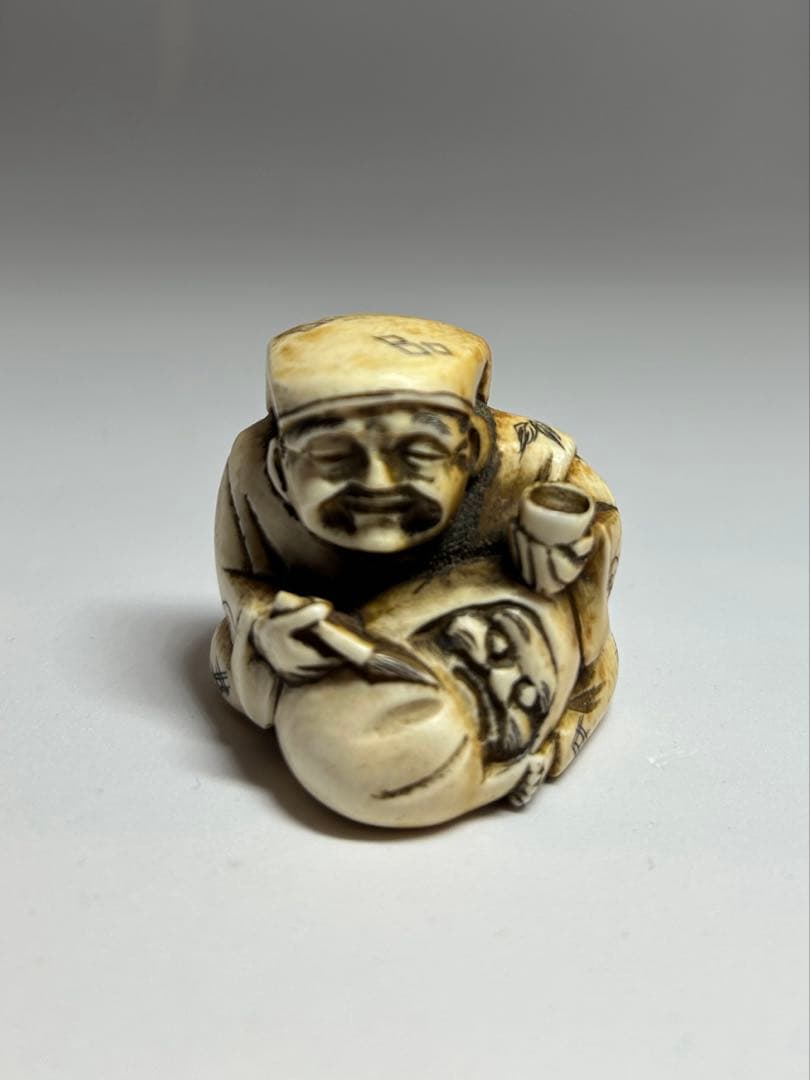 【銘あり】根付 人物像　大黒天風 骨 牙 （天然素材） 千広銘　29g