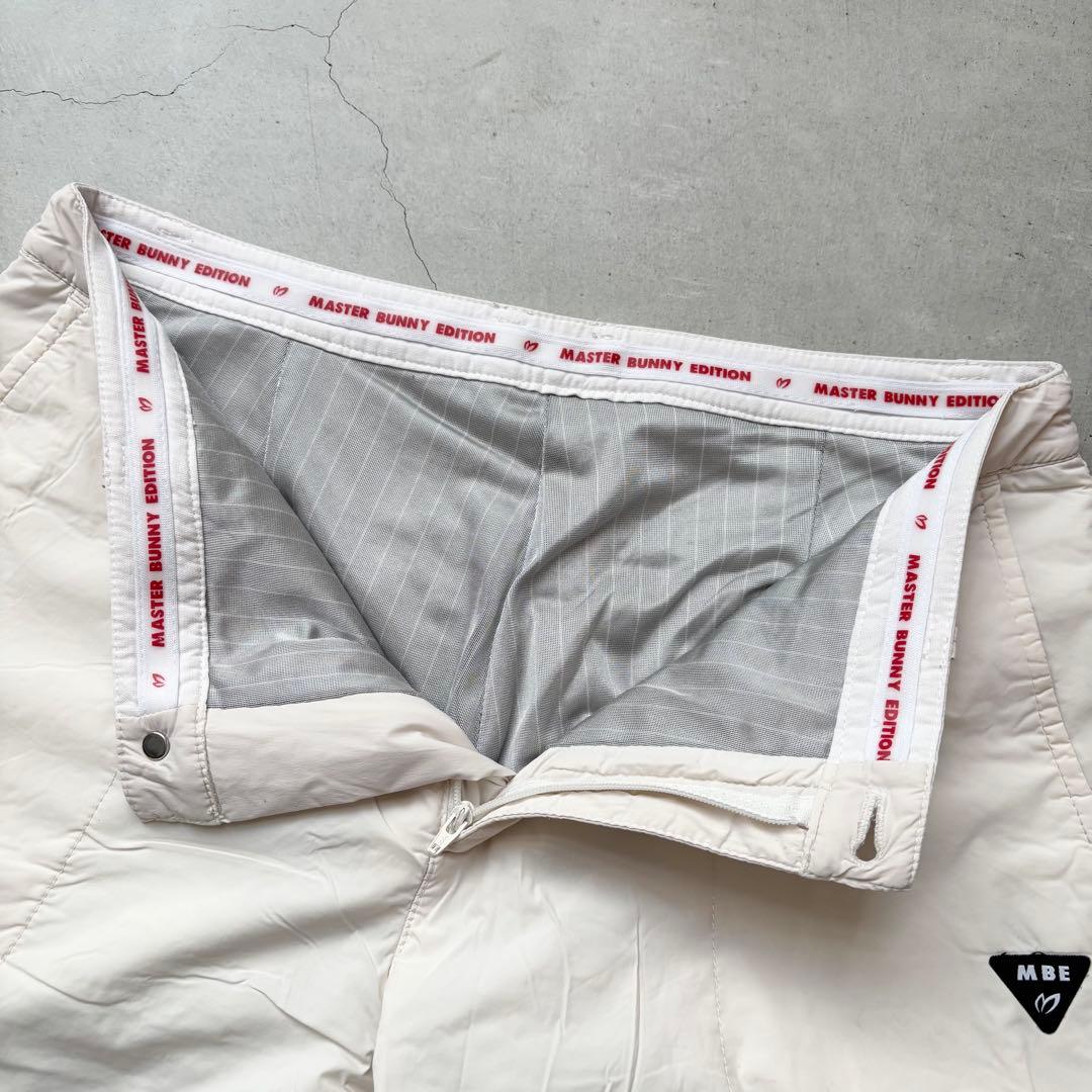 MASTER BUNNY EDITION 蓄熱裏地 中綿ロングパンツ ロゴ 白