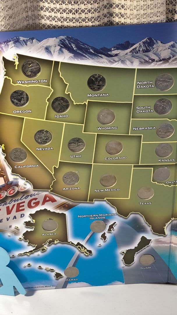 ♥♥。アメリカ25セントクォーター50州記念アルバム(56枚在中)。