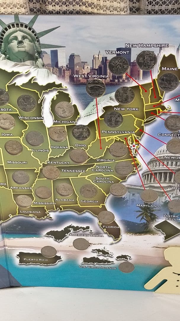 ♥♥。アメリカ25セントクォーター50州記念アルバム(56枚在中)。