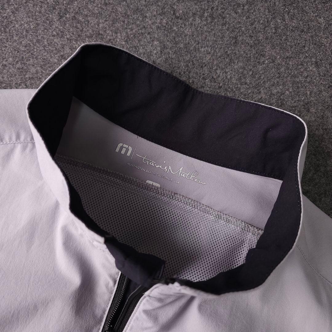 近年 トラヴィスマシュー 長袖ゴルフブルゾンジャケット ロゴネーム L ジップ