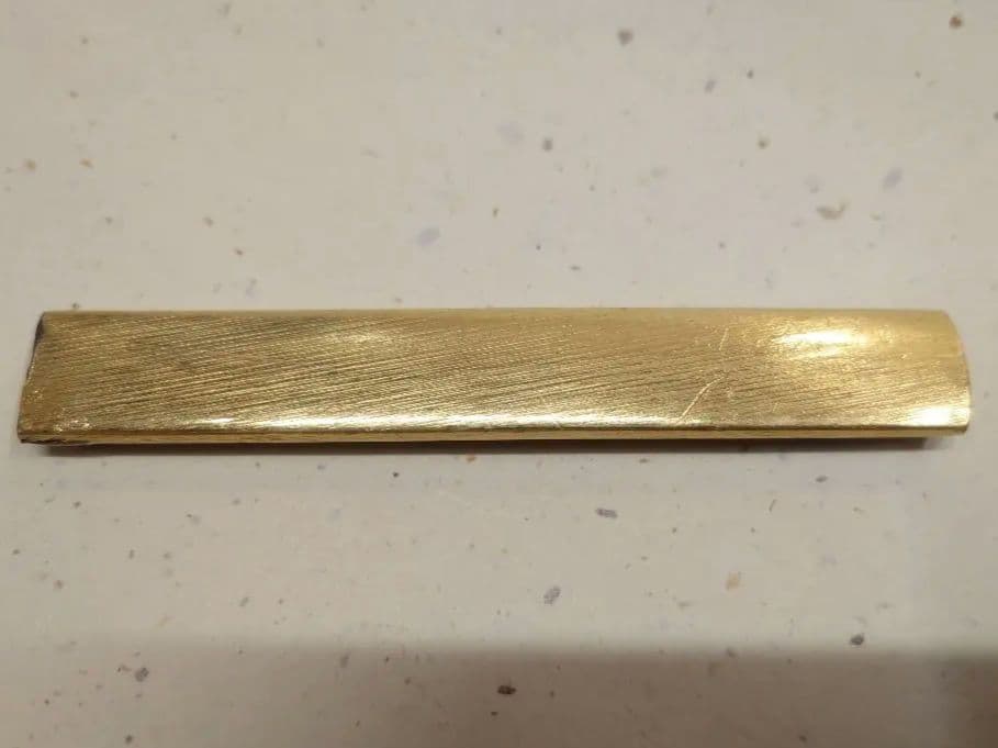 小柄袋、赤銅地に大黒引き唐子図