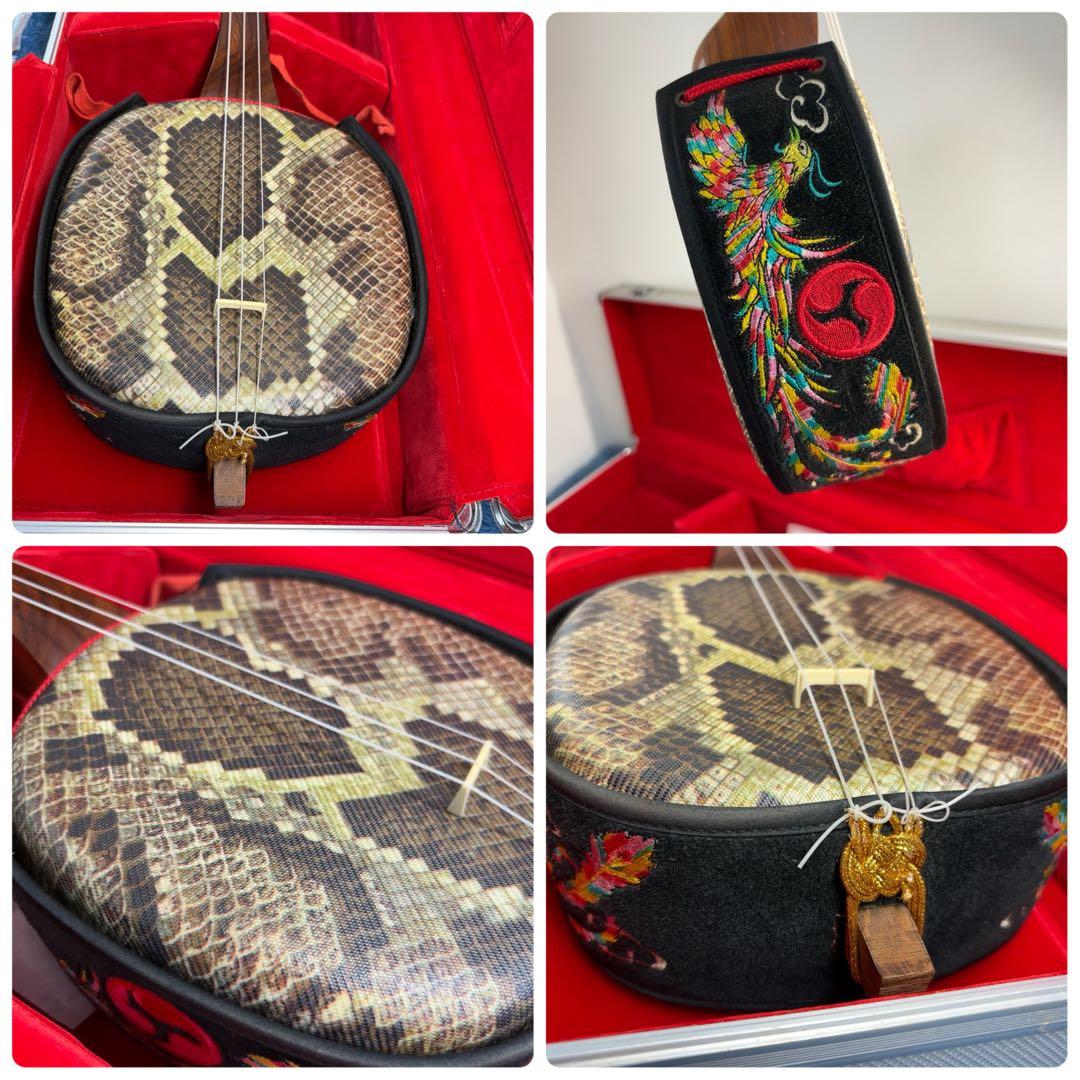 メル84509　沖縄三線 合皮 蛇柄 棹紫檀系 ハードケース付き