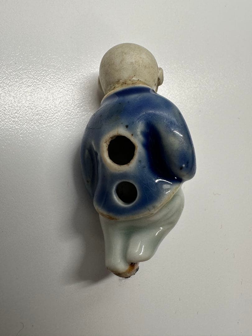 陶器根付　瑠璃青磁鉄釉獅子頭唐子根付