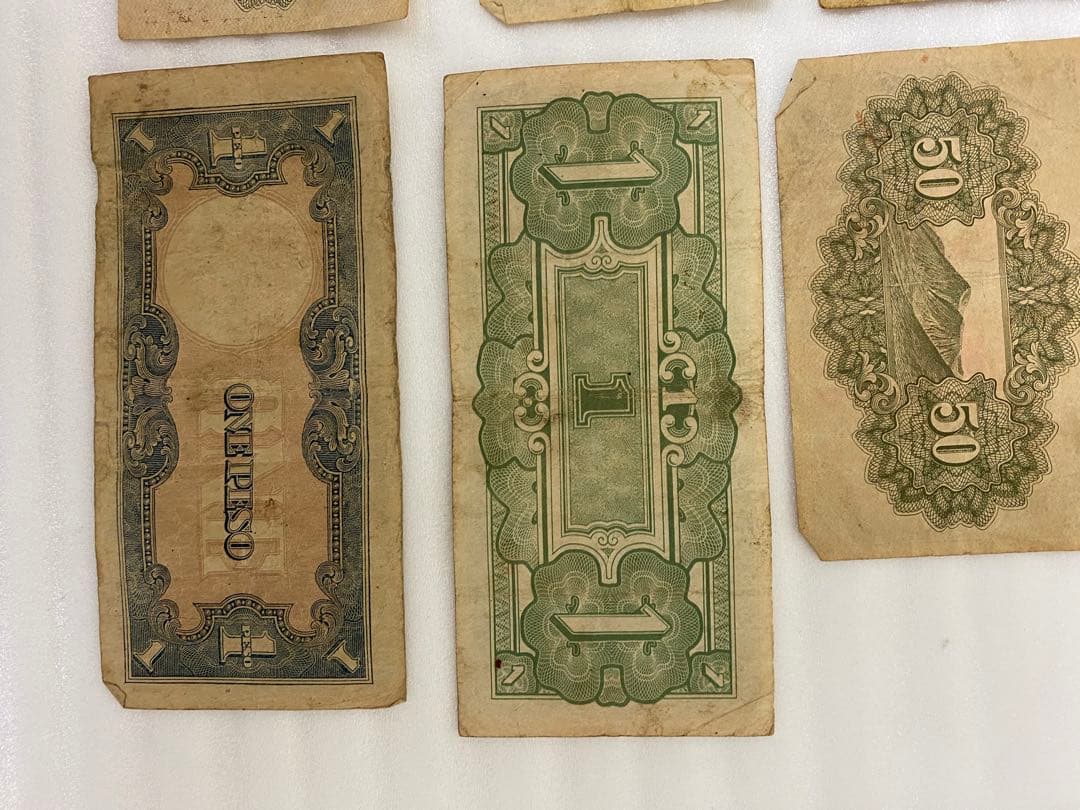 3-3256 旧貨幣18枚・靖国50銭『1組、77組、111組』