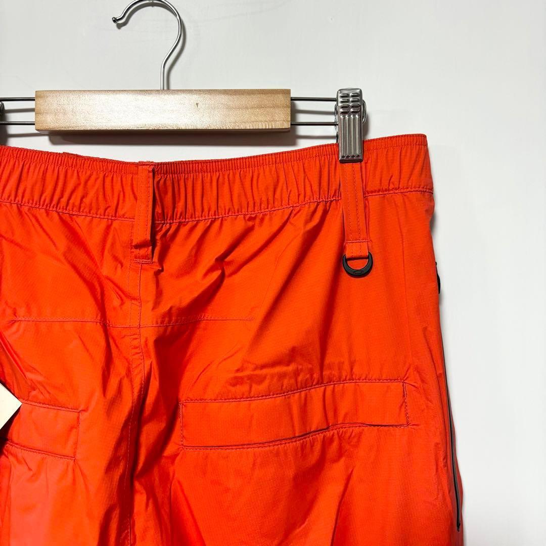 オークリー ゴルフ スカル スタウンチ 3D レインパンツ フレアオレンジ M