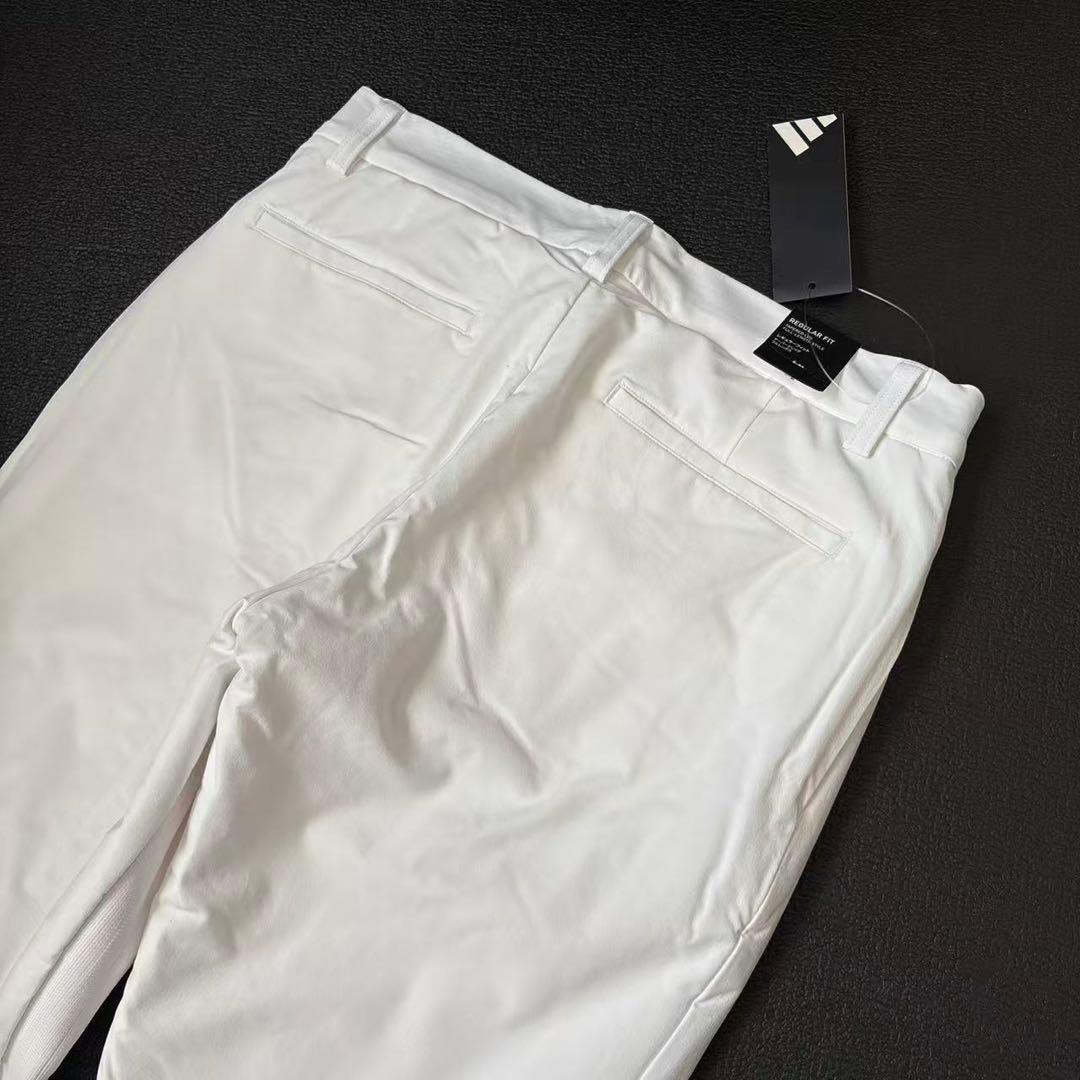 92cm白新品27500円アディダスゴルフ/メンズ/秋冬/中綿ストレッチパンツ/
