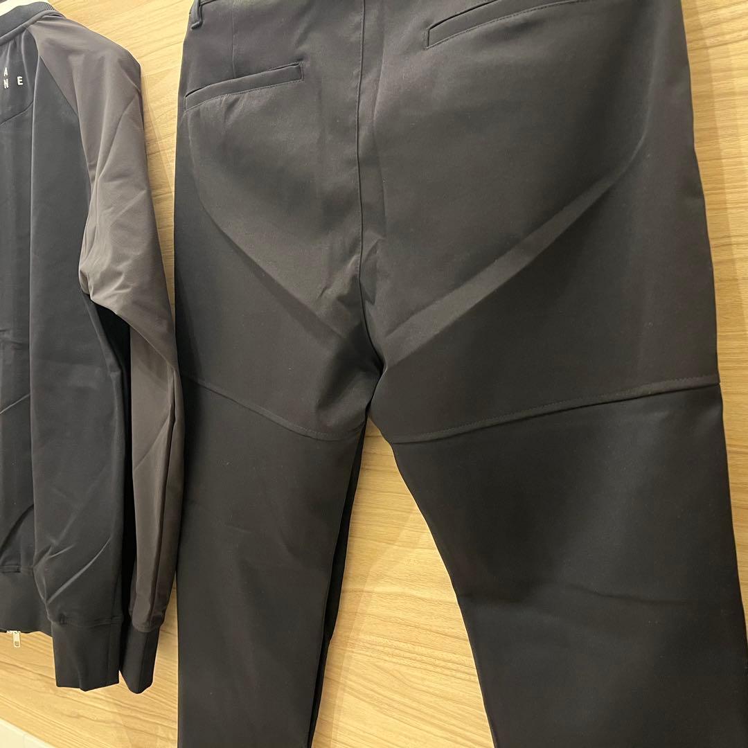 新品★63,800円 ブルゾン＆パンツ 上下2枚セットアップムータマリン 黒 4