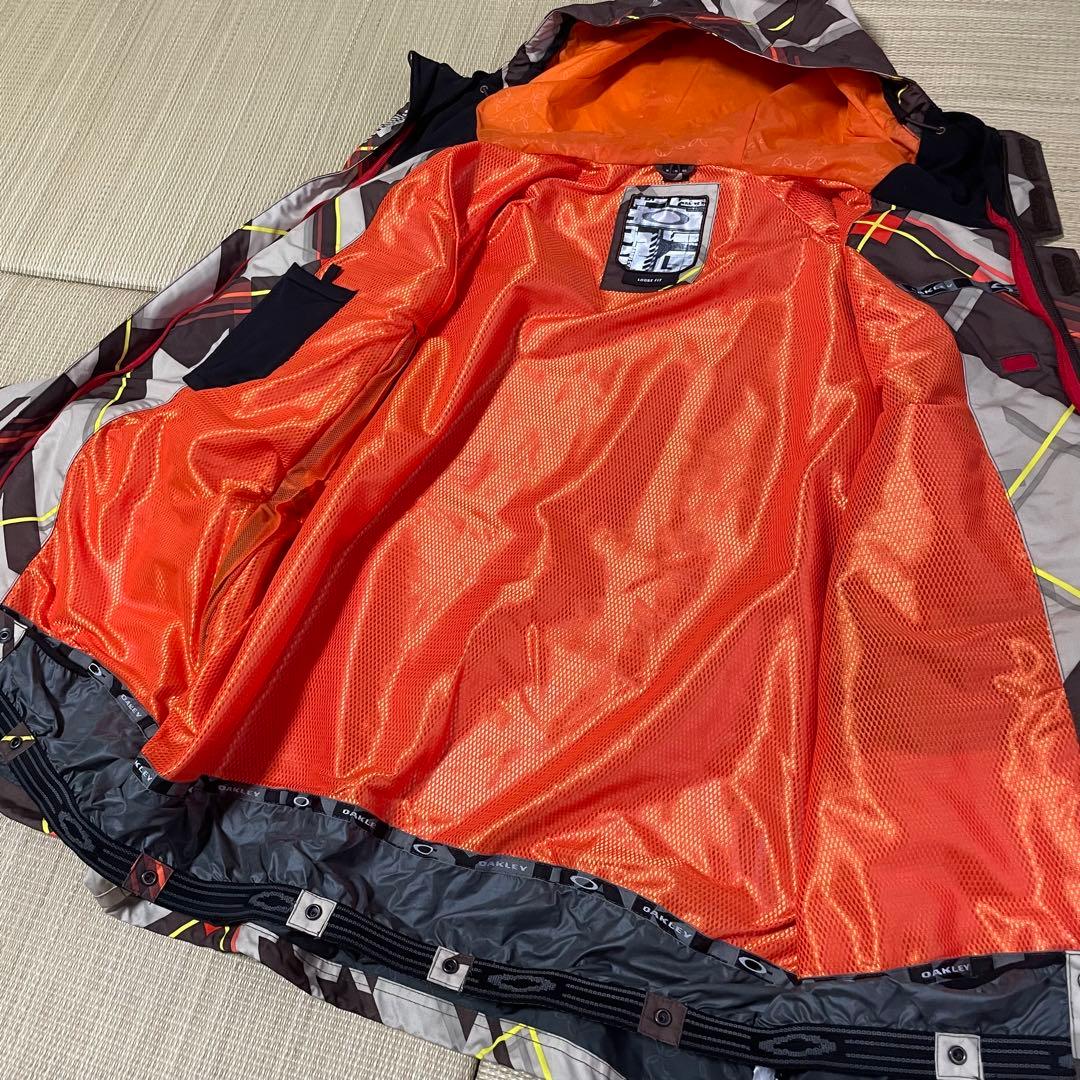 忠*の様 00s オークリー Oakley スノーボード ジャケット 幾何学模様