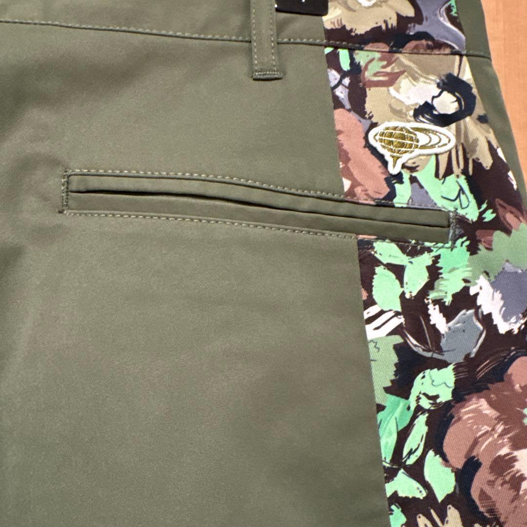 BEAMS GOLFオレンジレーベルフラワーカモプリントストレッチパンツ