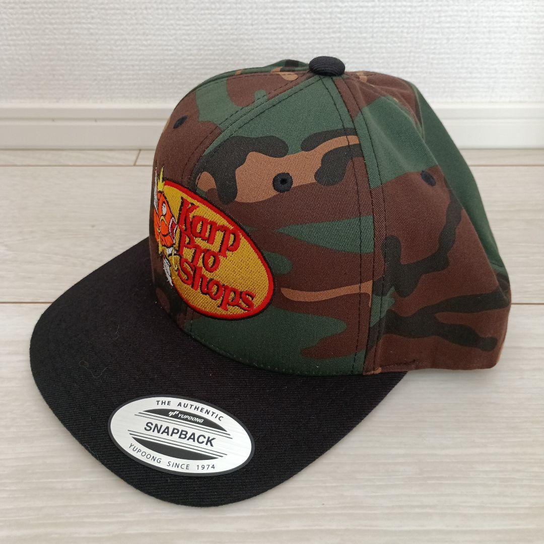 ウェア Bass Pro Shop Woodland Camo Snapback Cap