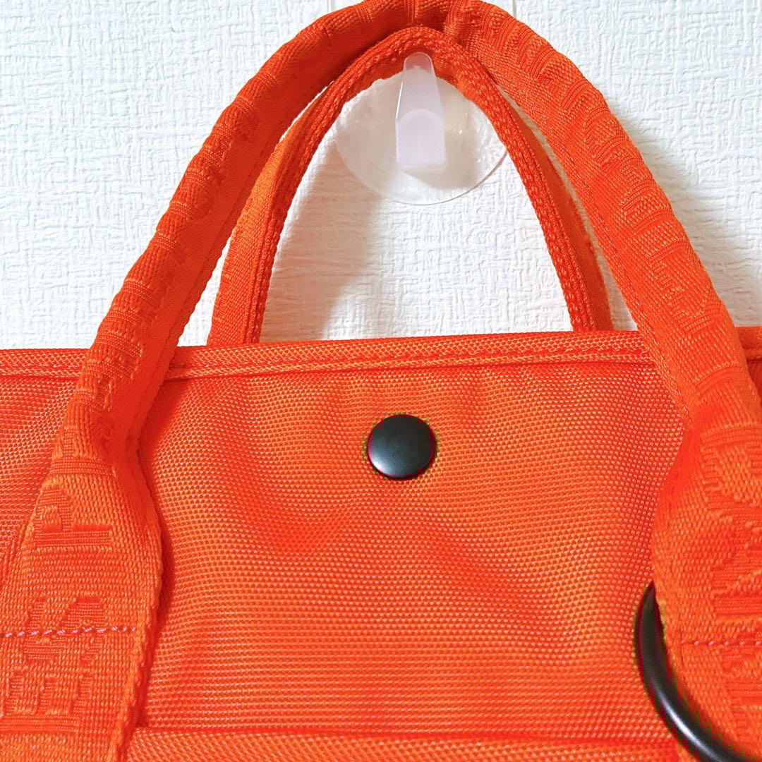 極美品 パーリーゲイツ ゴルフバッグ オレンジ ロゴチャーム付きカートバッグ