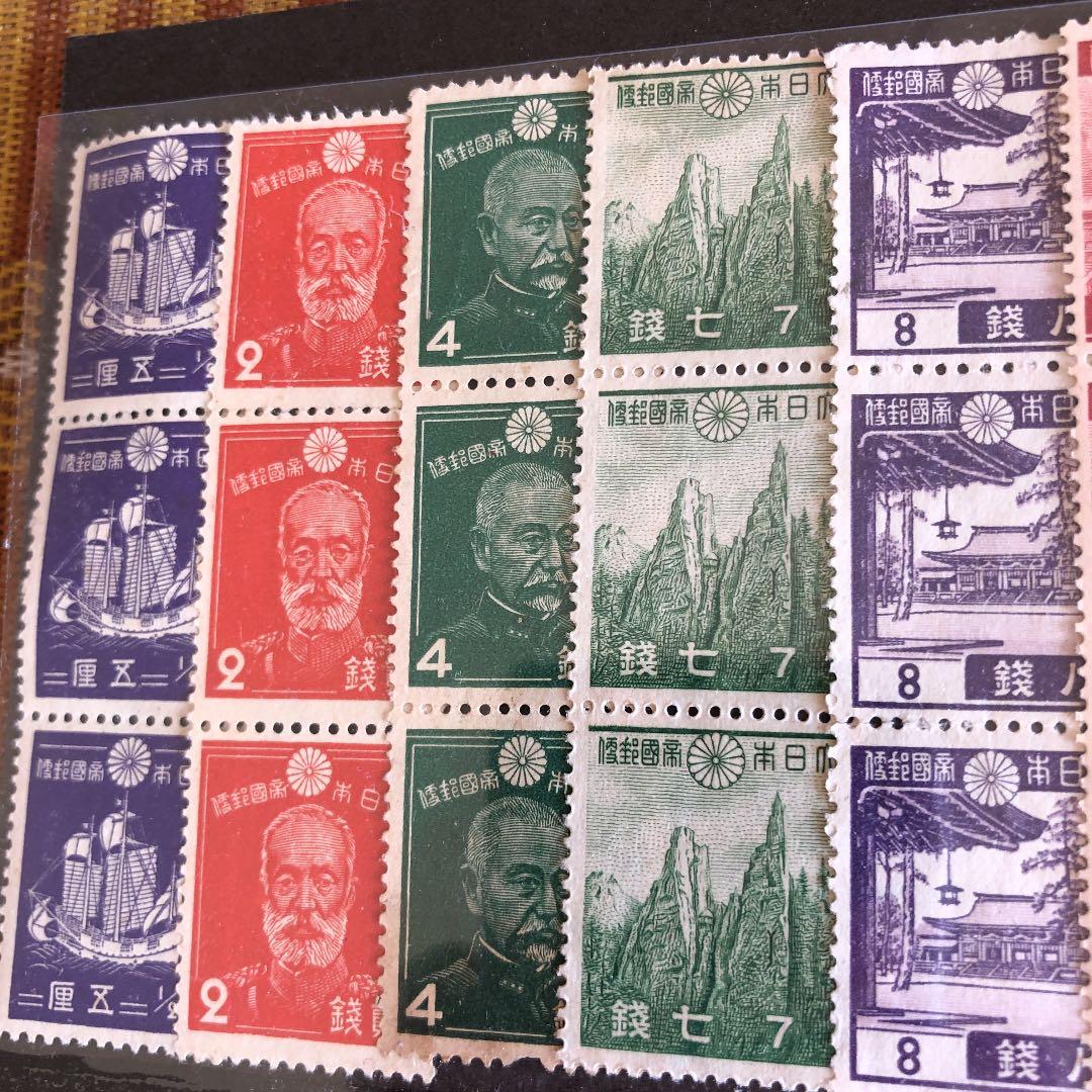 昭和14年～22年　大東亜戦争中・直後の切手２８種×３枚縦　計８４枚鑑賞シート入