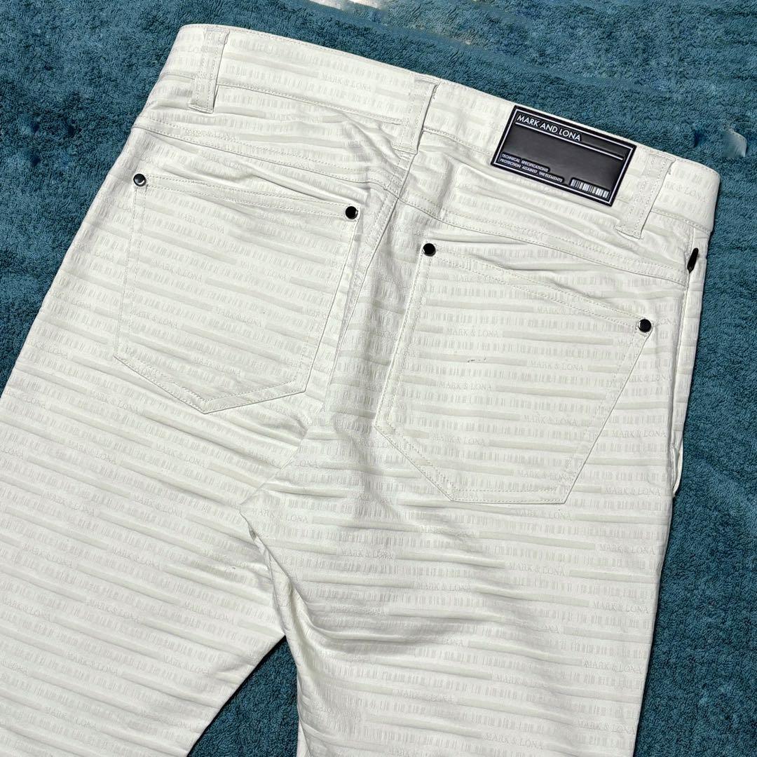 【未使用級】23AW マークアンドロナ ゴルフパンツ ロゴ総柄 ホワイト 44