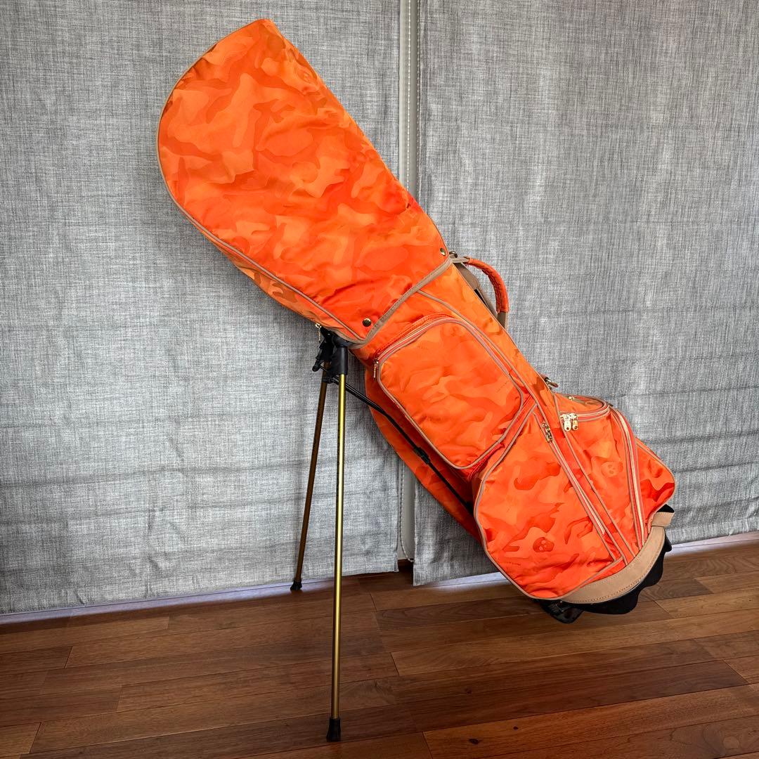 マークアンドロナ 迷彩 カモフラ ゴルフ キャディバッグ オレンジ