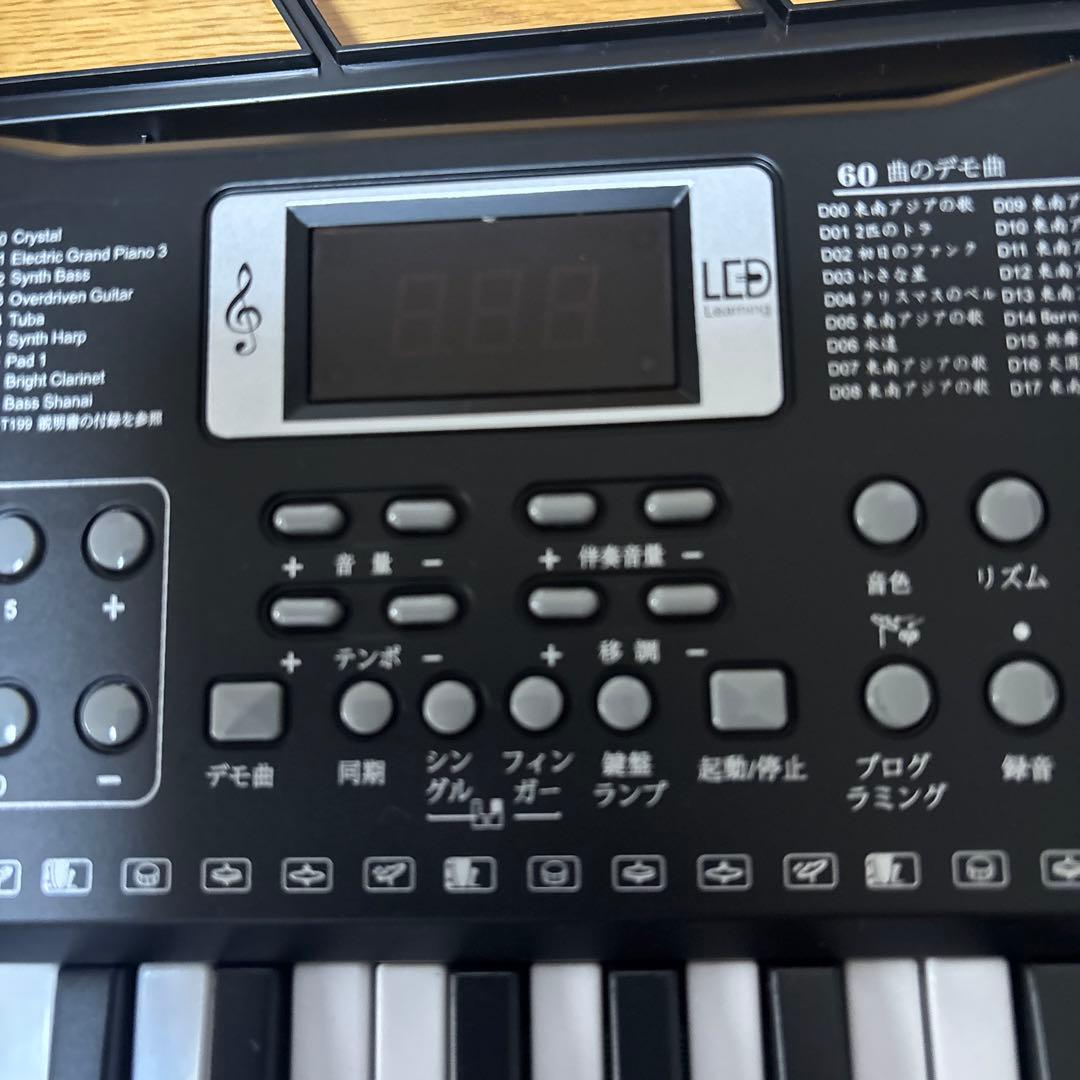 電子キーボード、譜面台と収納袋付き