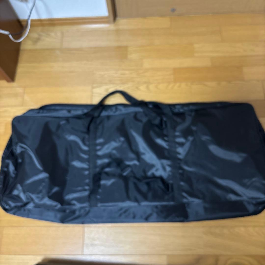 電子キーボード、譜面台と収納袋付き