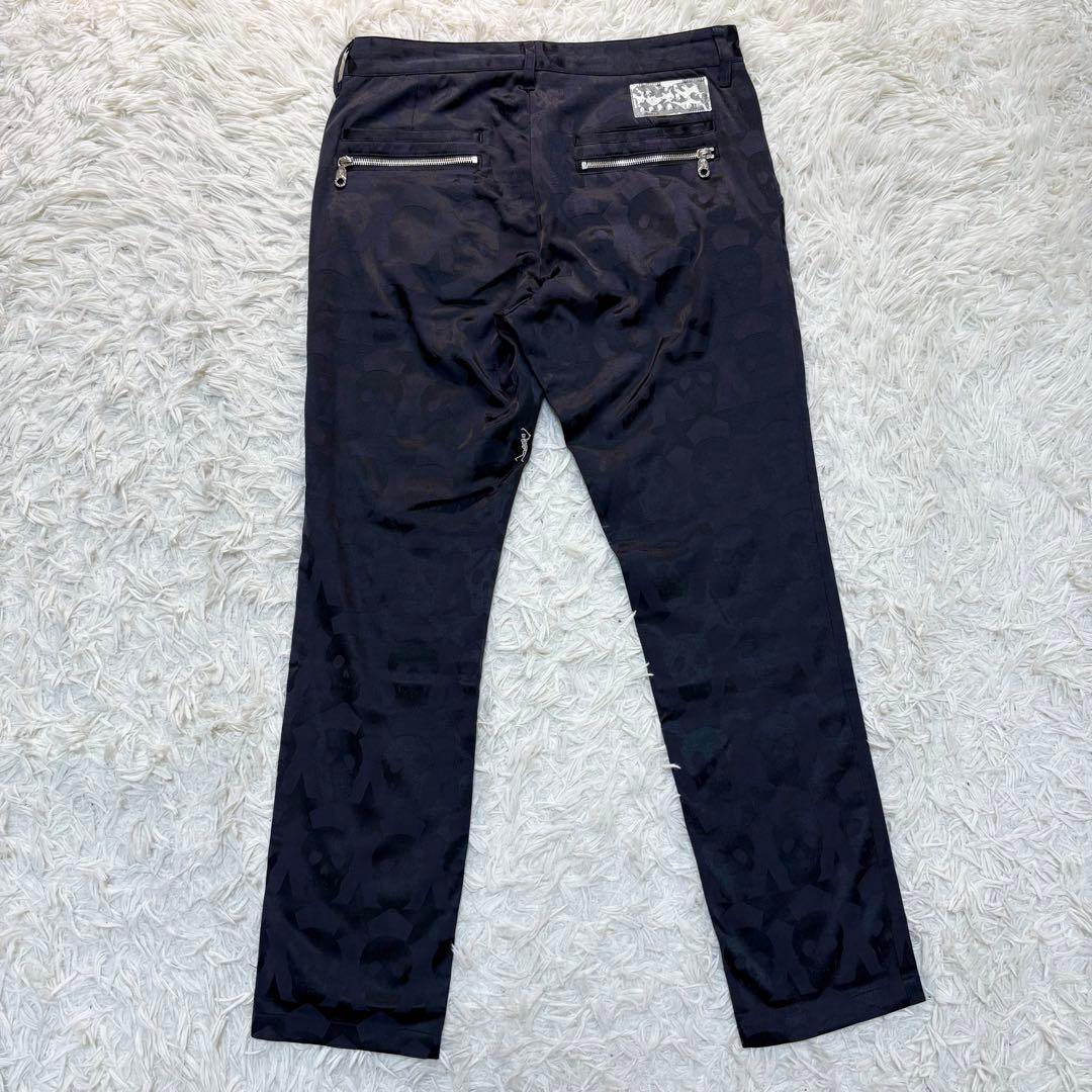 マークアンドロナ パンツ 総柄 スカル