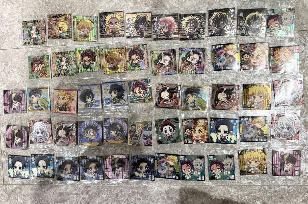 鬼滅の刃　まとめ　おひるねこ　色紙　ラバスト　シール　缶バッジ　アクスタ　引退