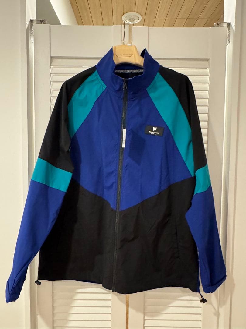 【定価2.7万】ROUNDCODE ストレッチ ナイロンブルゾン L ゴルフ 青