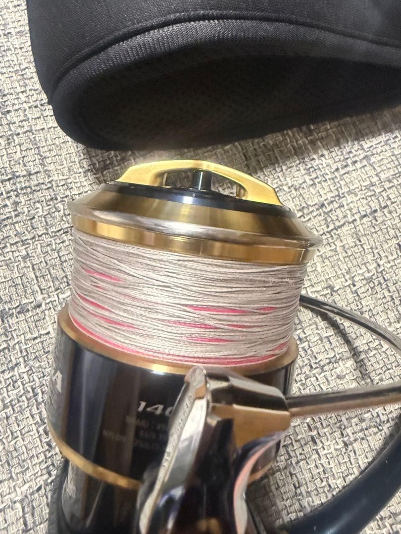 極上品20ソルティガ14000XHスピニングリール 巻き軽、ケース付き箱無し